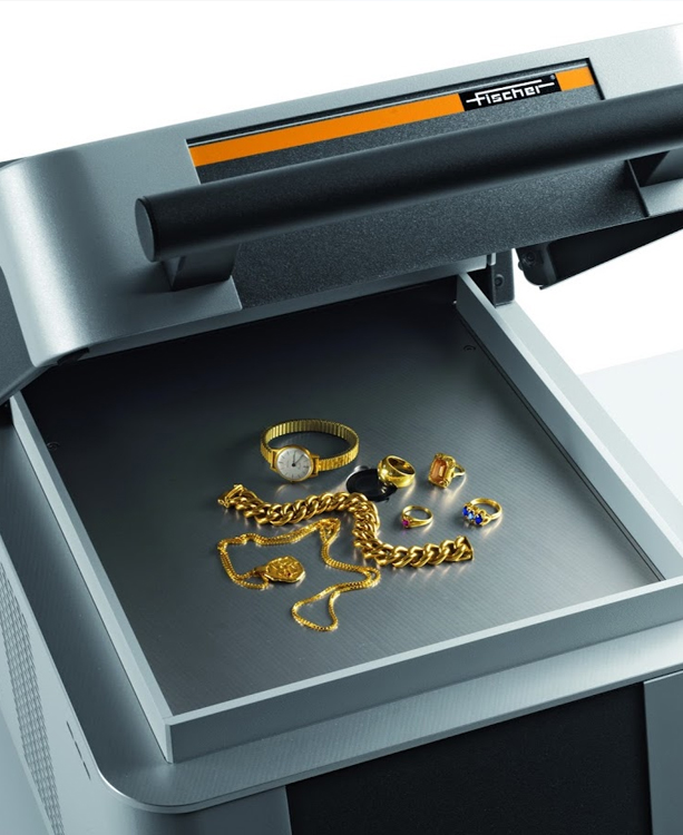 Gold sample in XRF machine for analysing the purity of gold